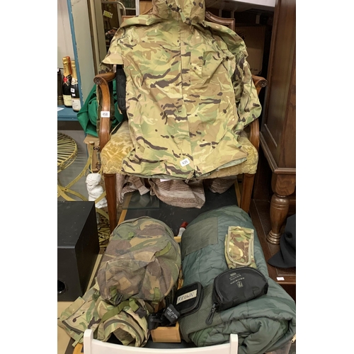 439 - Full survival kit with with camouflage raincoat and trousers, goggles ands sewing kit