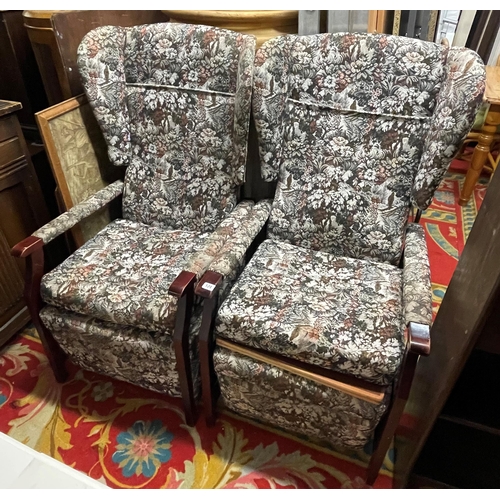 124 - PAIR OF RECLINING WING BACK ARMCHAIRS