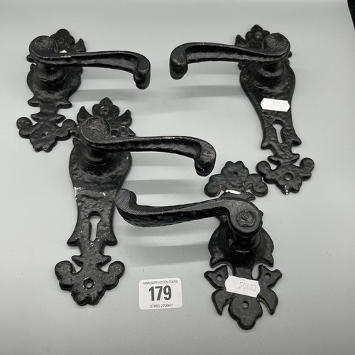 179 - FOUR ANTIQUE CAST IRON DOOR HANDLES