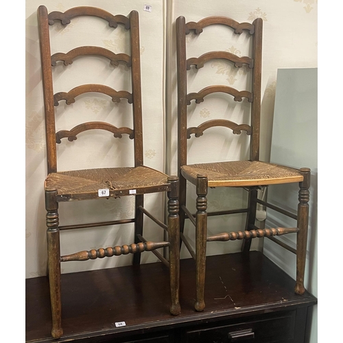 67 - PAIR OF ANTIQUE ARCHED LADDER BACK CHAIRS WITH BOBBIN STRETCHERS