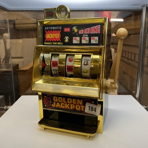 184 - GOLDEN JACKPOT ONE ARM BANDIT MONEY BANK