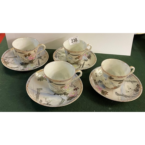 238 - FOUR ORIENTAL PAPER THIN PORCELAIN COFFEE CUPS ON SAUCERS