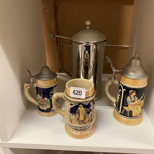 420 - THREE GERMAN STEINS AND A CHROME JUG