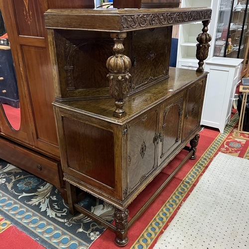 54 - BURR WALNUT HEAVILY CARVED BUFFET SIDEBOARD WITH TUDOR STYLE CARVED COLUMNS AND LEGS