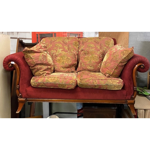 22 - TWO SEATER SCROLL ARM SETTEE WITH CARVED WOODEN FRAME ON SPLAY LEG