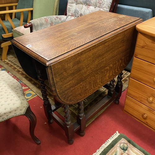 58 - OAK BARLEY SUGAR TWIST GATE LEG TABLE