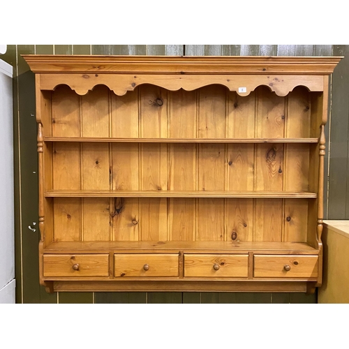 8 - PINE WALL HANGING PLATE RACK WITH FOUR DRAWERS