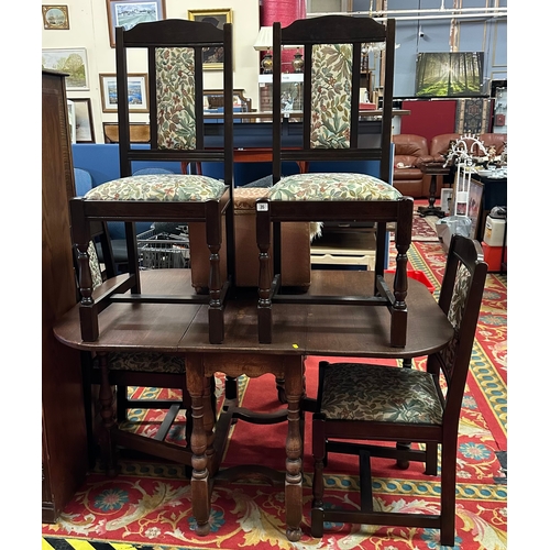 35 - DROP LEAF TABLE IN OAK, COMPLETE WITH FOUR DINING CHAIRS