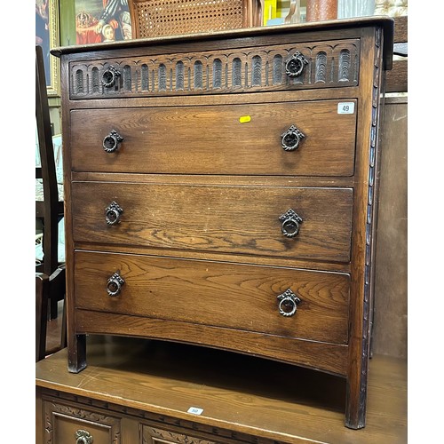 49 - CARVED OAK FOUR DRAWER CHEST OF DRAWERS