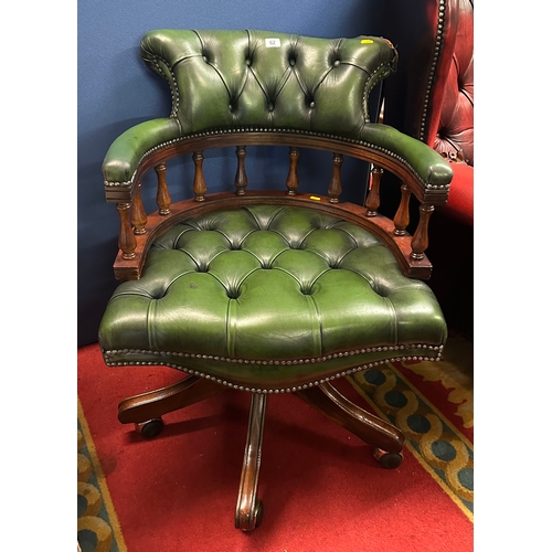 62 - GREEN LEATHER OFFICE DESK CHAIR, BUTTON BACK AND BUTTON SEAT, SWIVEL CHAIR.