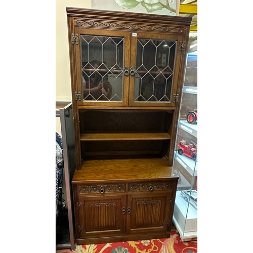 105 - OLD CHARM OAK LINEN FOLD, LEAD GLASS DRESSER