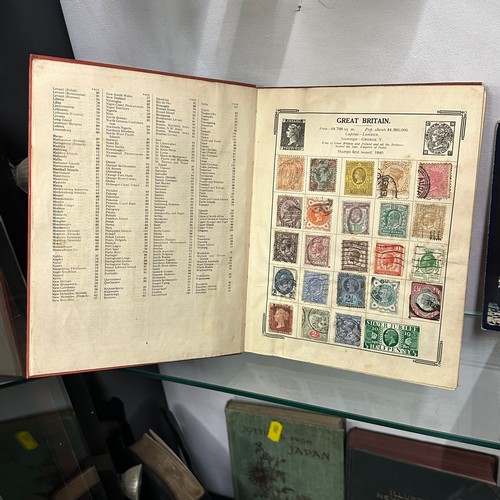 154 - ATLAS STAMPS ALBUM CONTAINING VARIOUS STAMPS