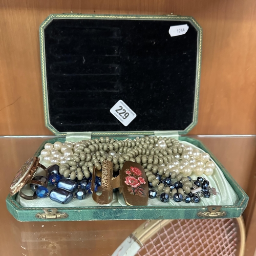 229 - VINTAGE CASE OF COSTUME JEWELLERY