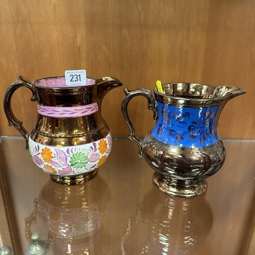 231 - TWO COPPER LUSTRE JUGS