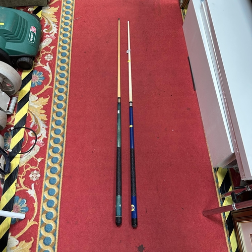 290 - TWO POOL CUES