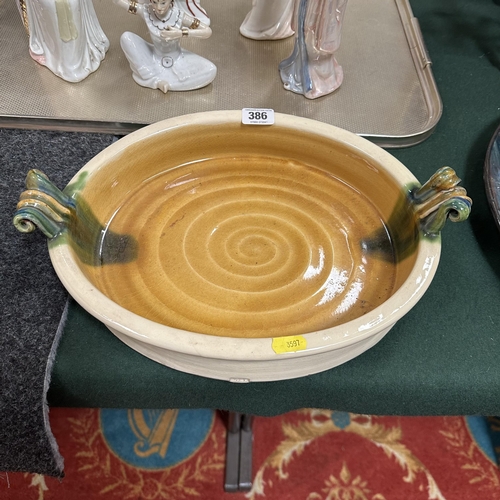 386 - DOUBLE HANDLED TERRACOTTA GLAZED DISH