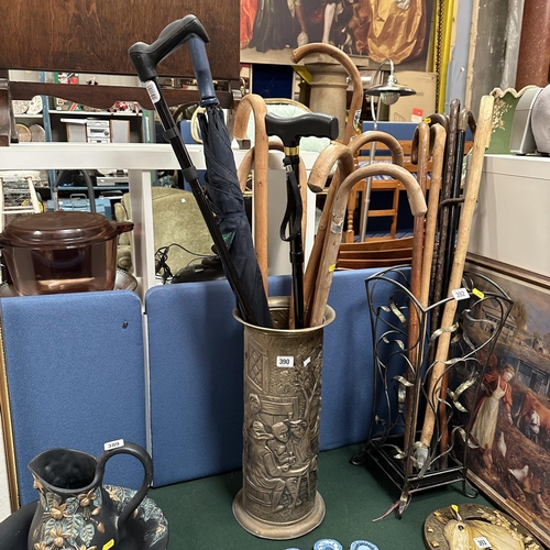 390 - BRASS STICK STAND CONTAINING UMBRELLAS AND WALKING STICKS