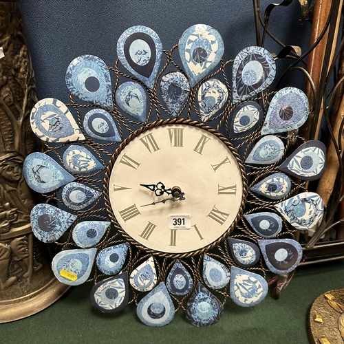 391 - DECORATIVE METAL WALL CLOCK