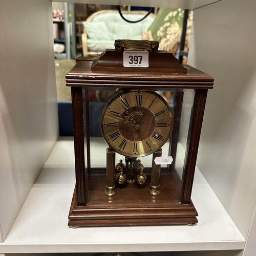 397 - GLASS AND WOOD MANTEL CLOCK