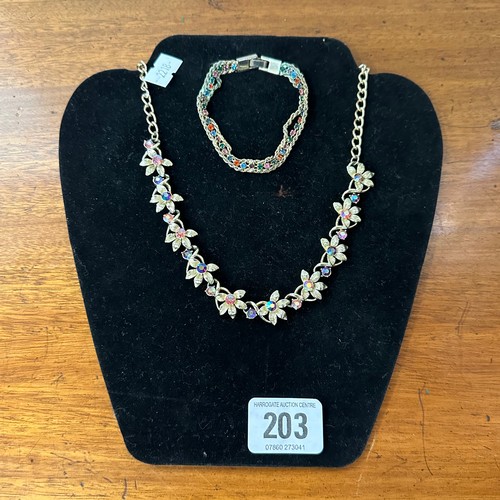 203 - SILVER TONE FLORAL NECKLACE AND SILVER TONE BRACELET