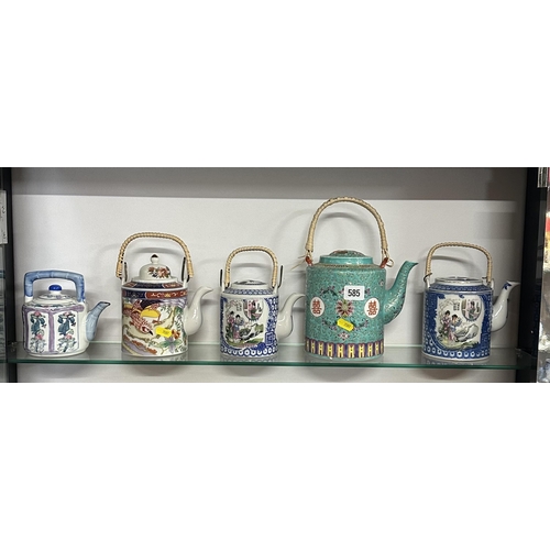 585 - FIVE ORIENTAL TEAPOTS