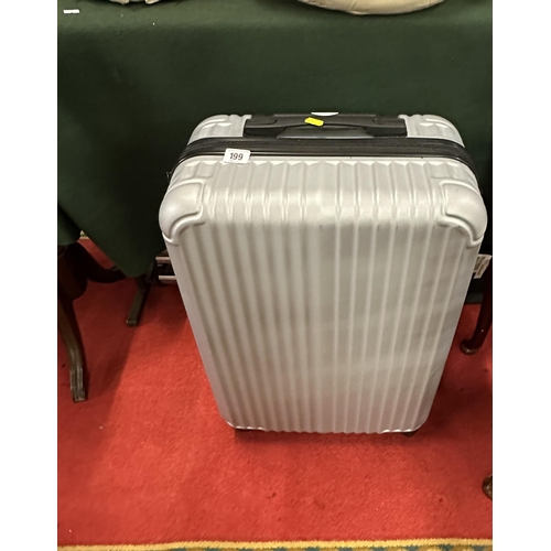 199 - SILVER MSG PULL ALONG SUITCASE