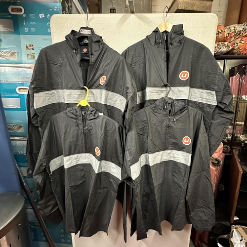 318 - FOUR BRAND NEW RAINCOATS