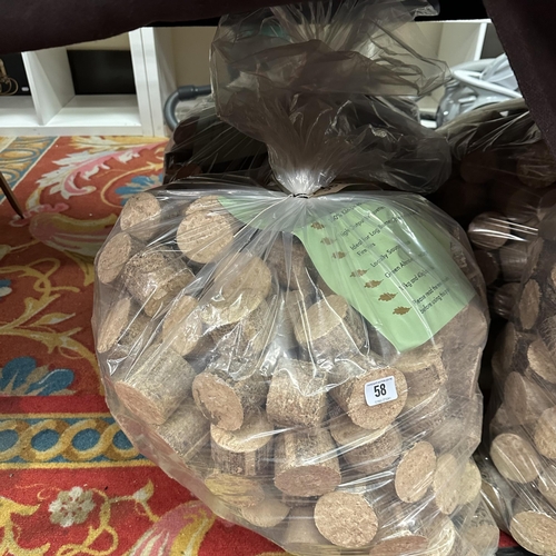 58 - TWO 30KG BAGS OF HARDWOOD BRIQUETTES