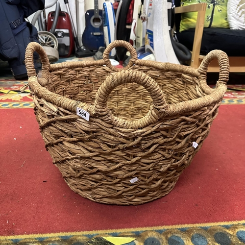 584 - LARGE FOUR HANDLED WOVEN BASKET