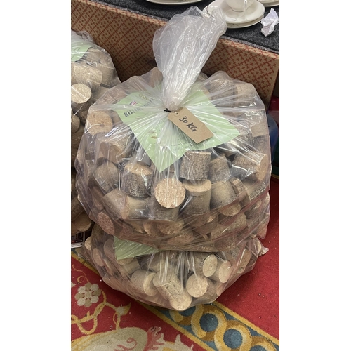 65 - TWO 30KG BAGS OF HARDWOOD BRIQUETTES