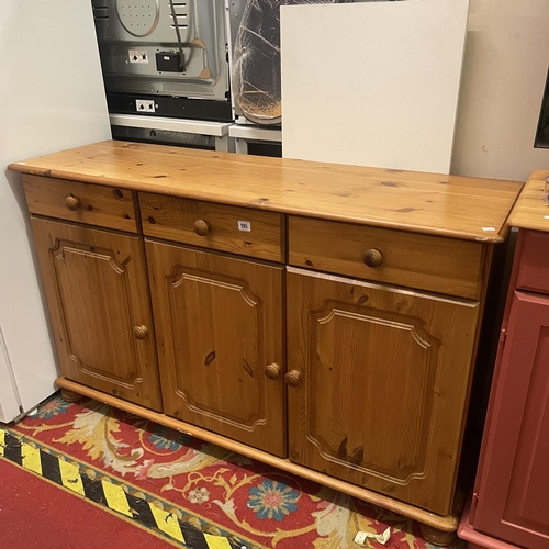 185 - PINE THREE DOOR THREE DRAWER SIDEBOARD