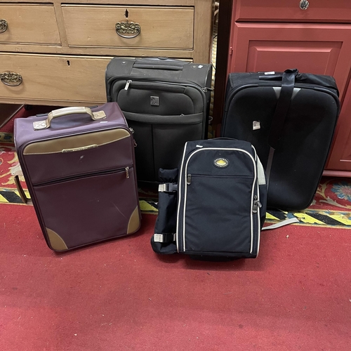 15 - FOUR CARRY ON SUITCASES