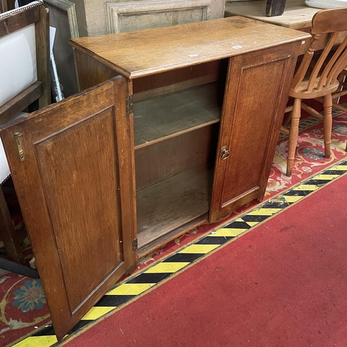 169 - EDWARDIAN OAK DOUBLE DOOR CUPBOARD