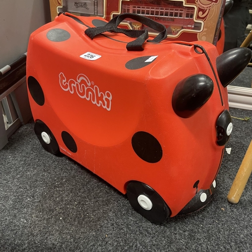 226 - TRUNKI SIT ON CHILDS SUITCASE