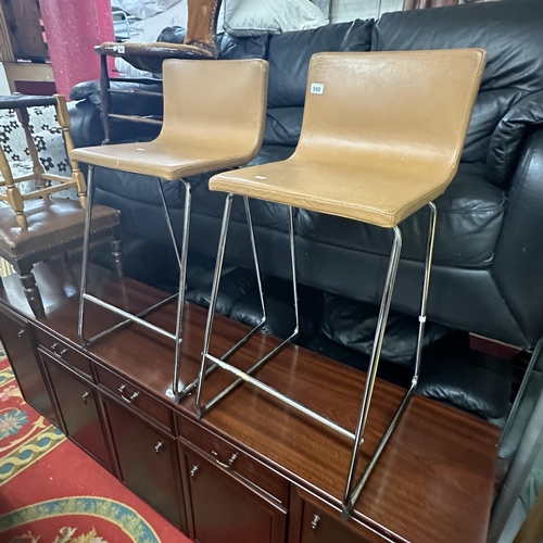 540 - TWO LEATHER STOOLS