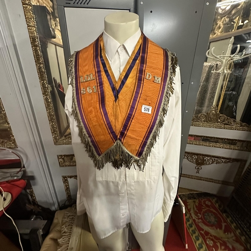 578 - THREE VINTAGE ORANGE LODGE COLLARETTE