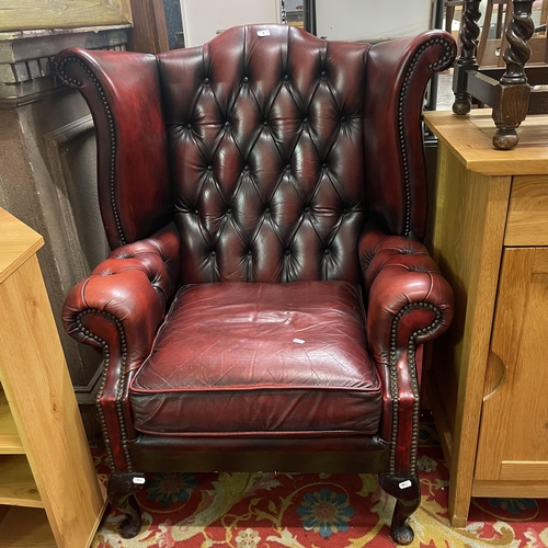 1 - OXBLOOD RED LEATHER CHESTERFIELD ARMCHAIR