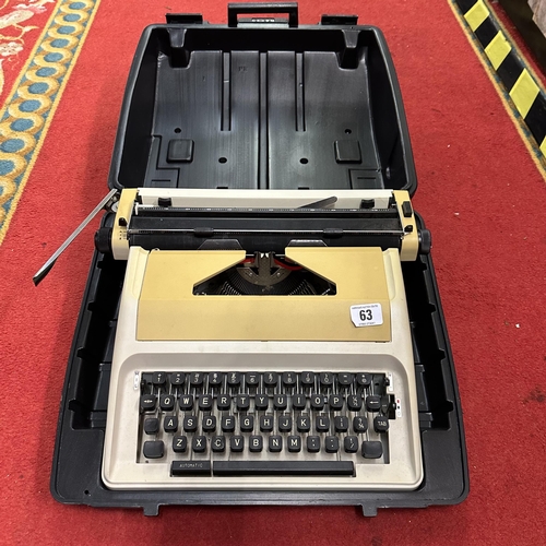 63 - TYPE WRITER