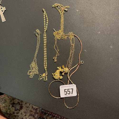 557 - YELLOW METAL NECKLACES