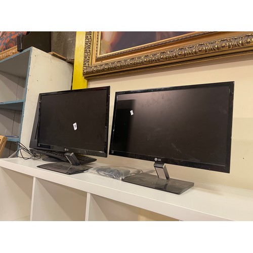 25 - TWO LG MONITORS