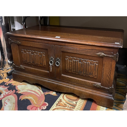 78 - OLD CHARM OAK CABINET WITH LINEN FOLD CARVED FRONT