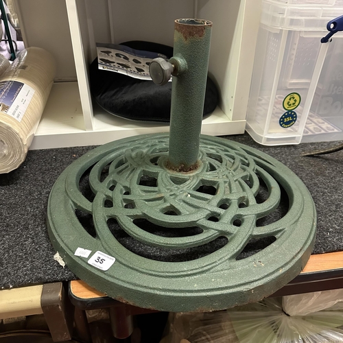 35 - CAST IRON PARASOL STAND