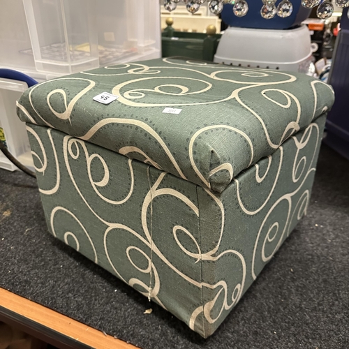 45 - UPHOLSTERED POUFFE WITH STORAGE