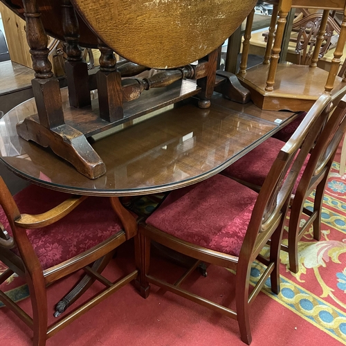 214 - MAHOGANY DINING TABLE WITH FOUR CHAIRS AND TWO CARVERS