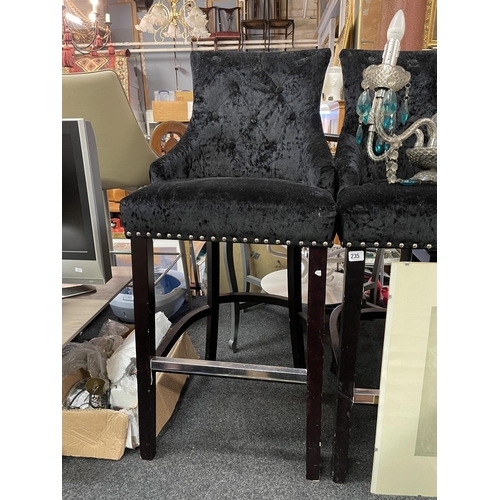 235 - BLACK VELVET HIGH BAR STOOL WITH STUDS PUNCTUATING THE FRONT AND SIDE RAILS WITH DECORATIVE METAL BU... 