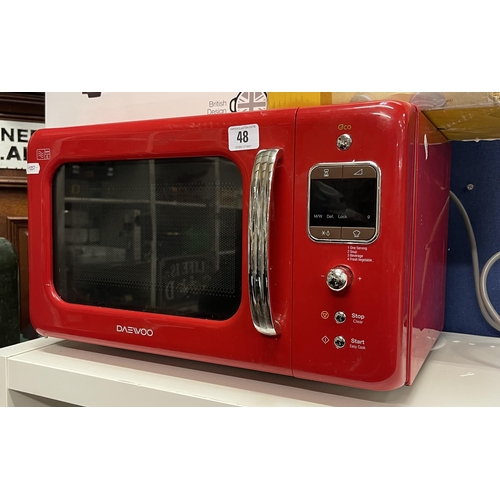 48 - DAEWOO MICROWAVE IN WORKING ORDER