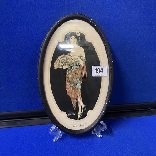 194 - ANTIQUE FRAMED PICTURE OF A LADY DRESSED IN COCKTAIL DRESS TITLED “THE FAN” SIGNED BOTTOM LEFT