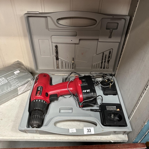 33 - POWER DEVIL DRILL IN BOX WITH CHARGER