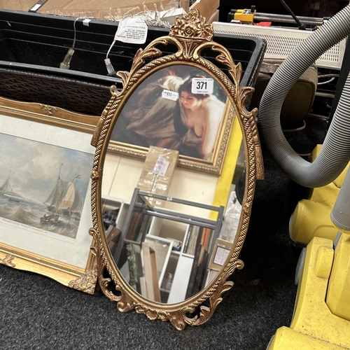 371 - OVAL ORNATE METAL MIRROR