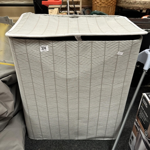 374 - LARGE LAUNDRY BASKET WITH HANDLES